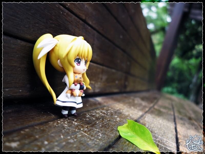 Anime figure on wooden bench