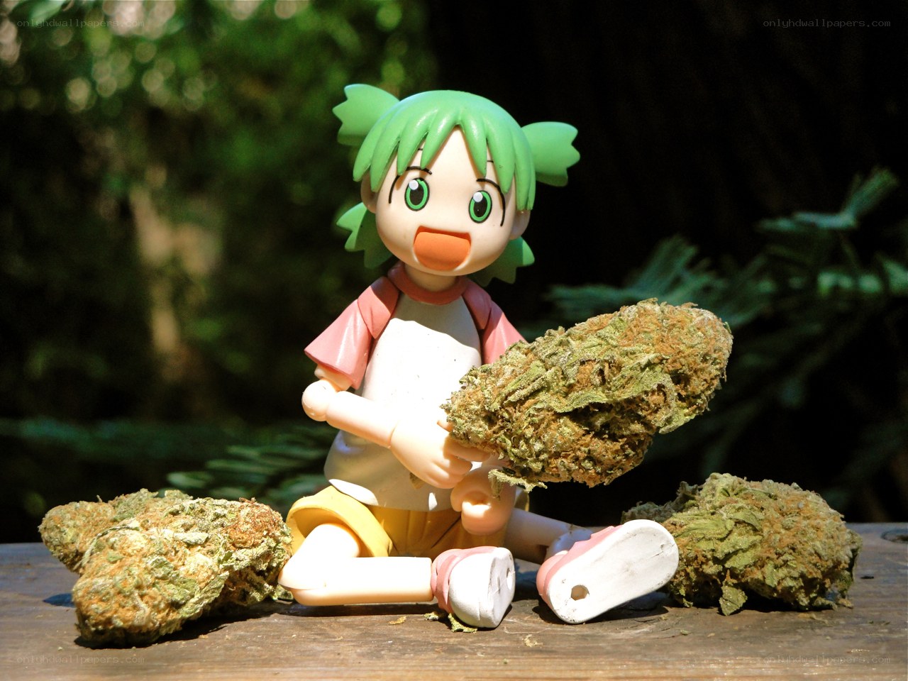 Anime figure with cannabis buds