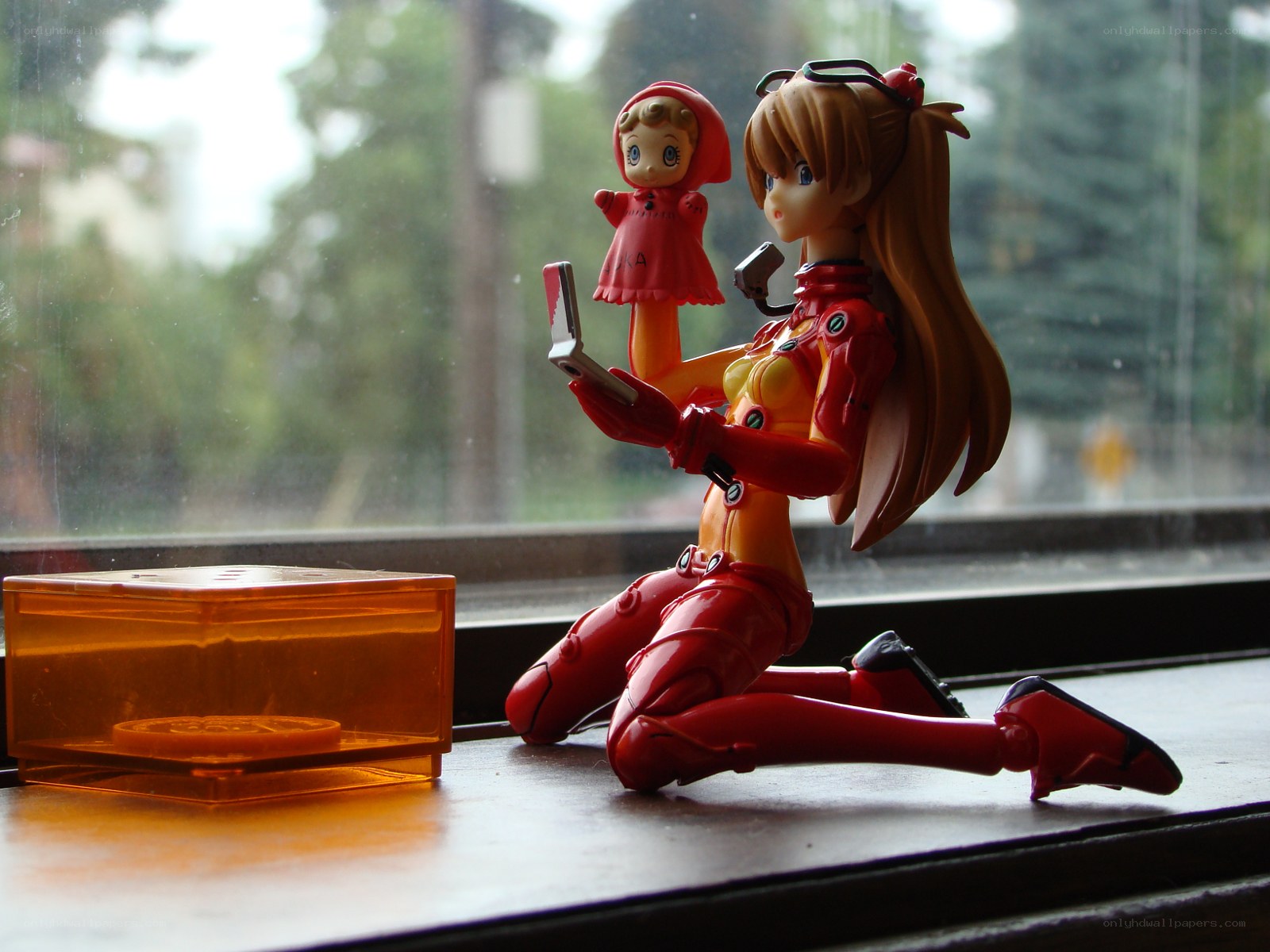 Anime figure with doll by window