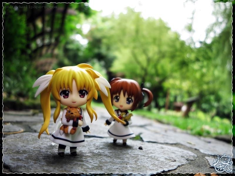 Anime figures in a garden