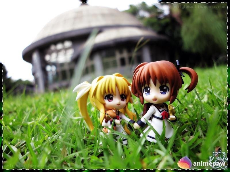 Anime figures in the grass