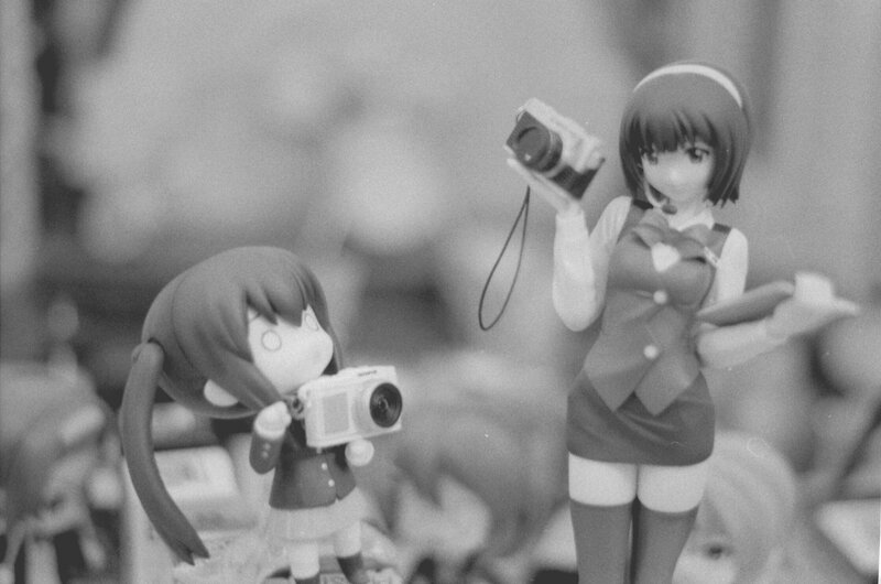 Anime figures with cameras