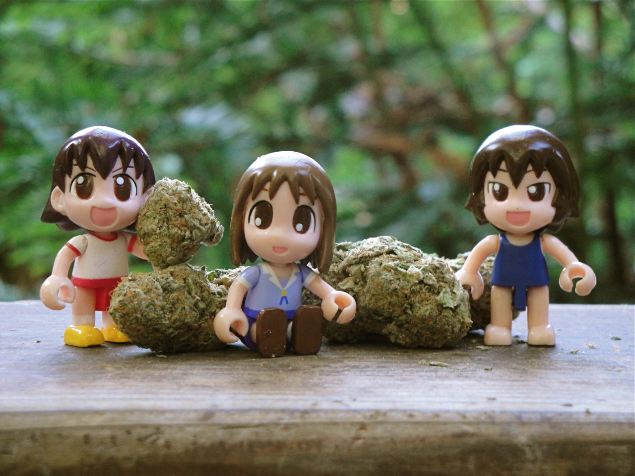 Anime figures with cannabis buds