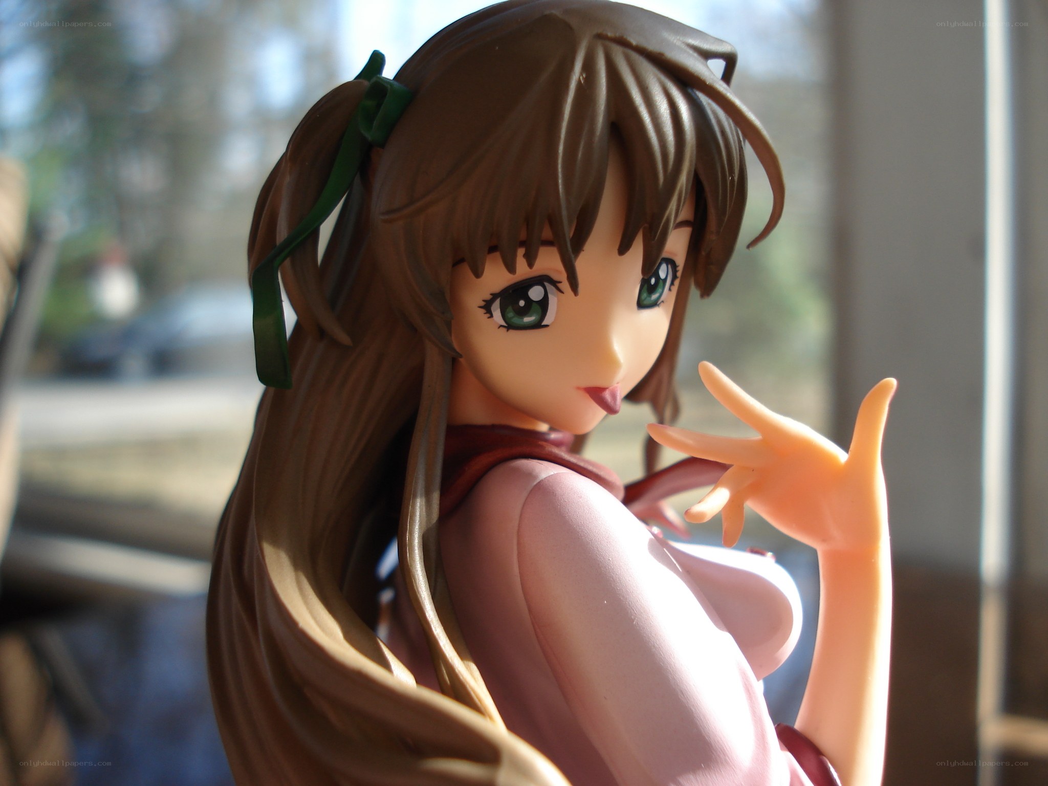 anime figurine by window