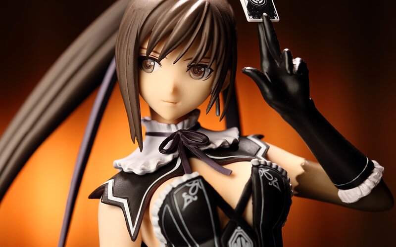 Anime Figurine Holding Card