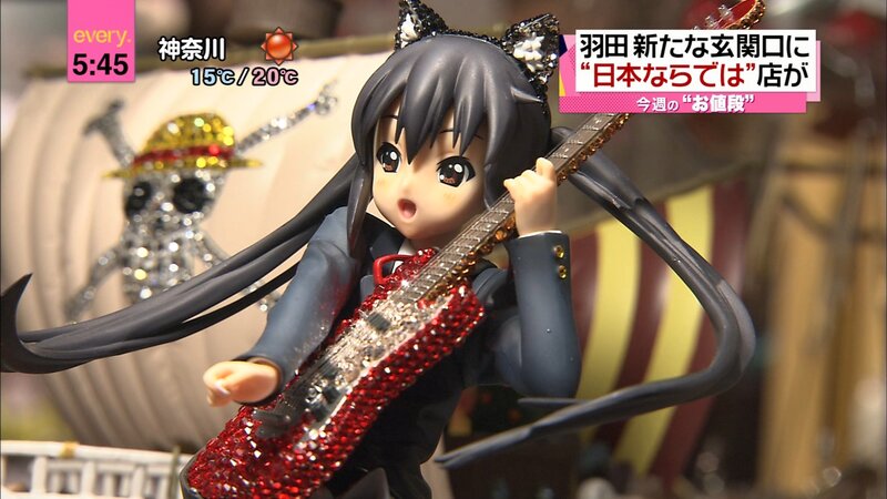 Anime Figurine Holding Guitar