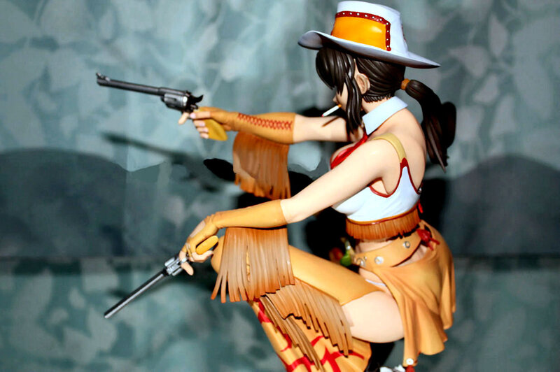 Anime Figurine Holding Guns — Brown