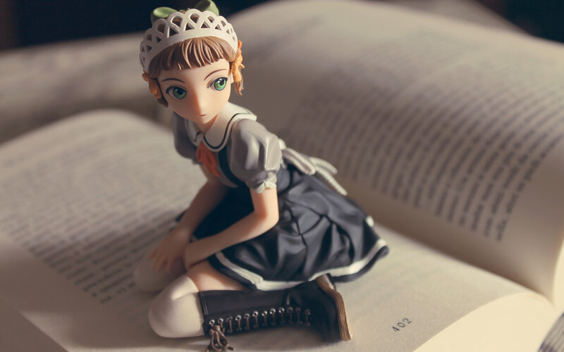 Anime Figurine on Book