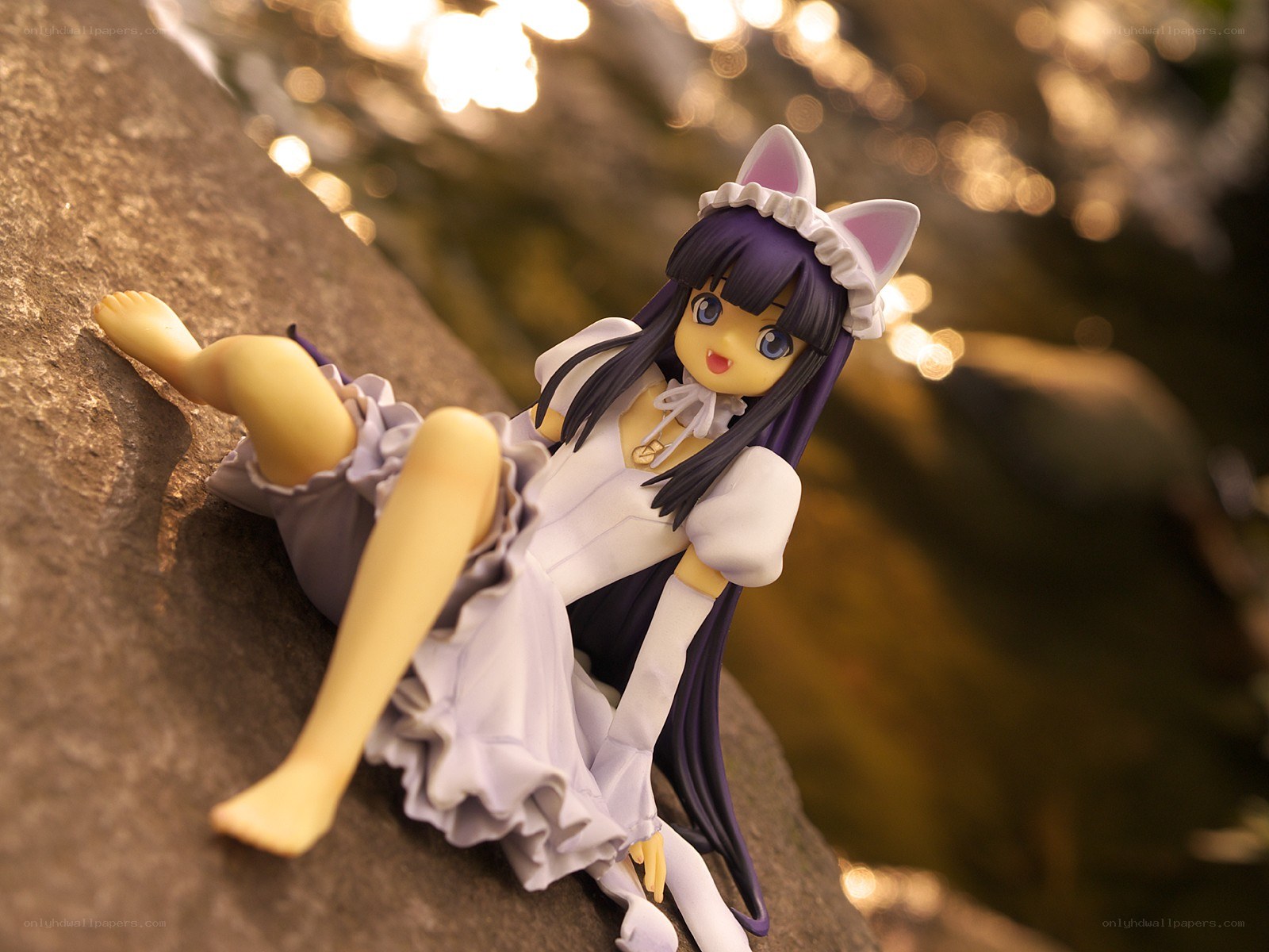 anime figurine on rock