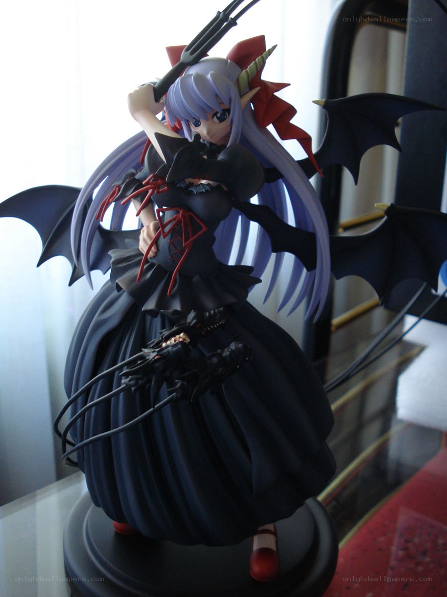 anime figurine with bat wings