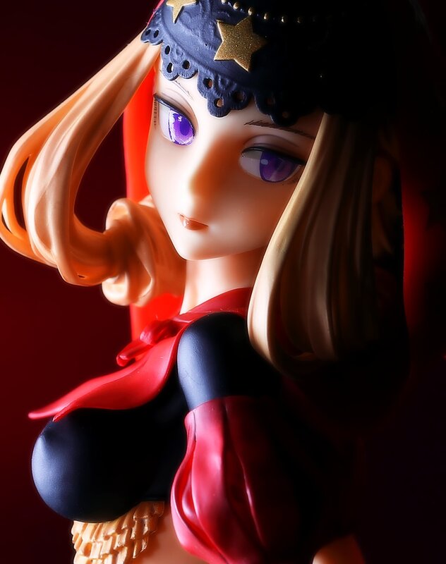 anime figurine with purple eyes