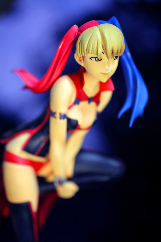 anime figurine with red and blue hair