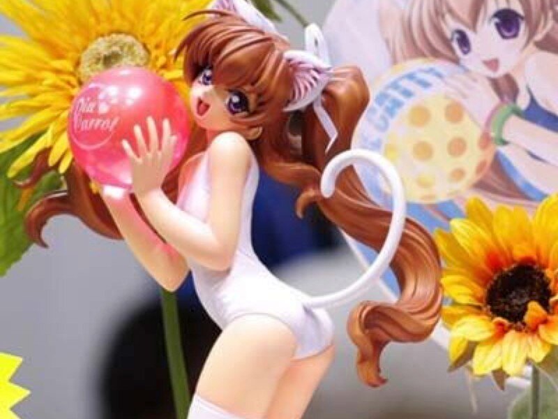 anime figurine with sunflowers