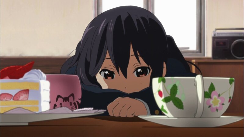 anime girl at table with cake