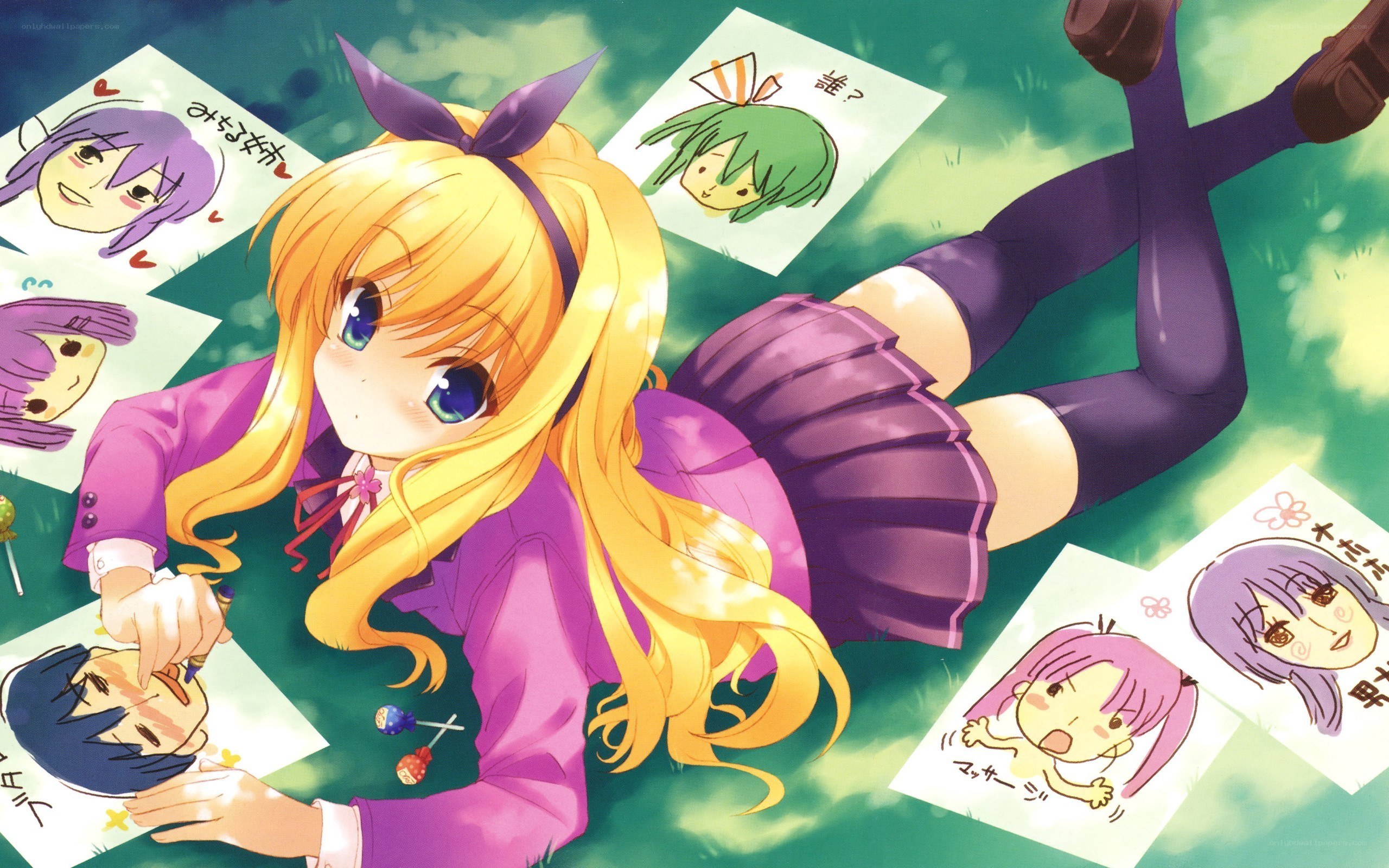 Anime girl drawing on grass