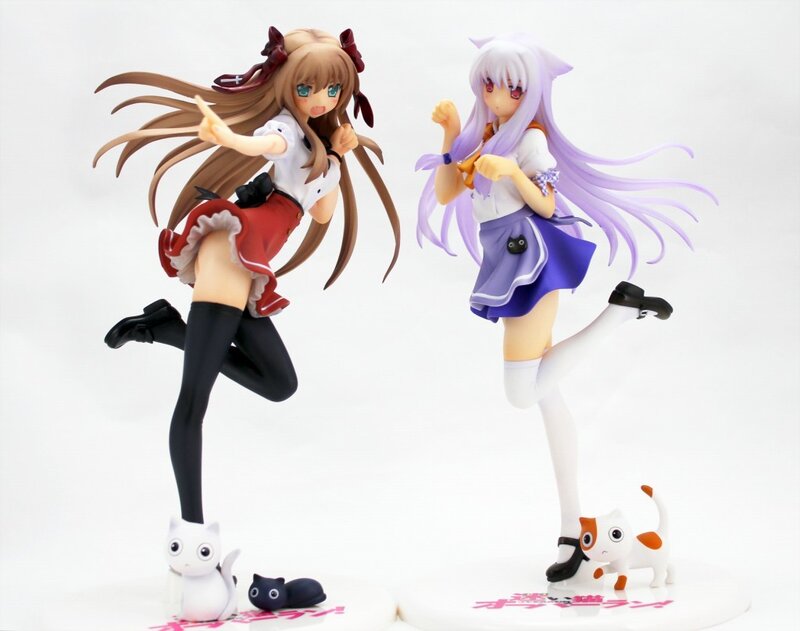 Anime girl figurines with cats