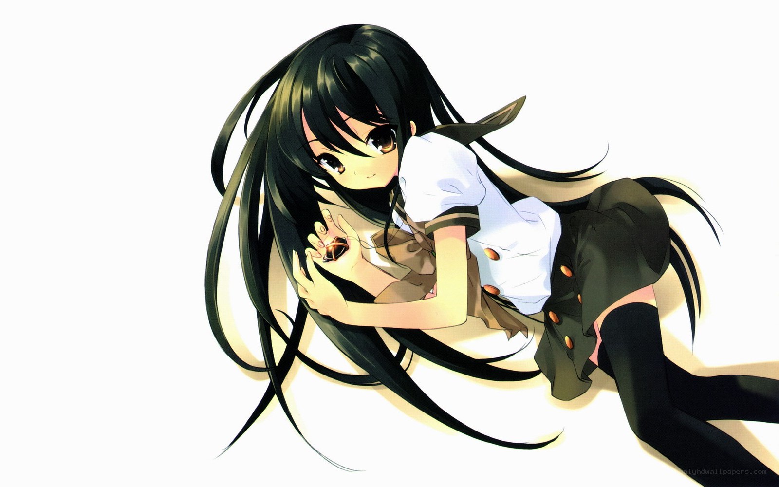 anime girl holding a charm
