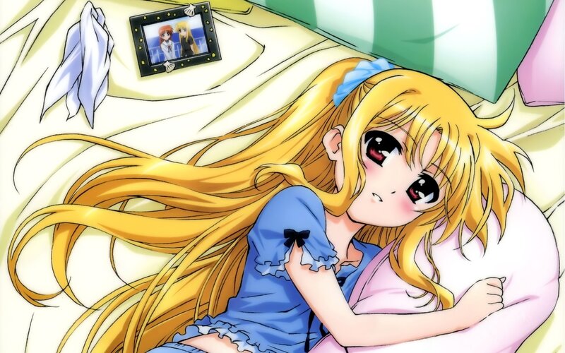 Anime girl in bed with photo