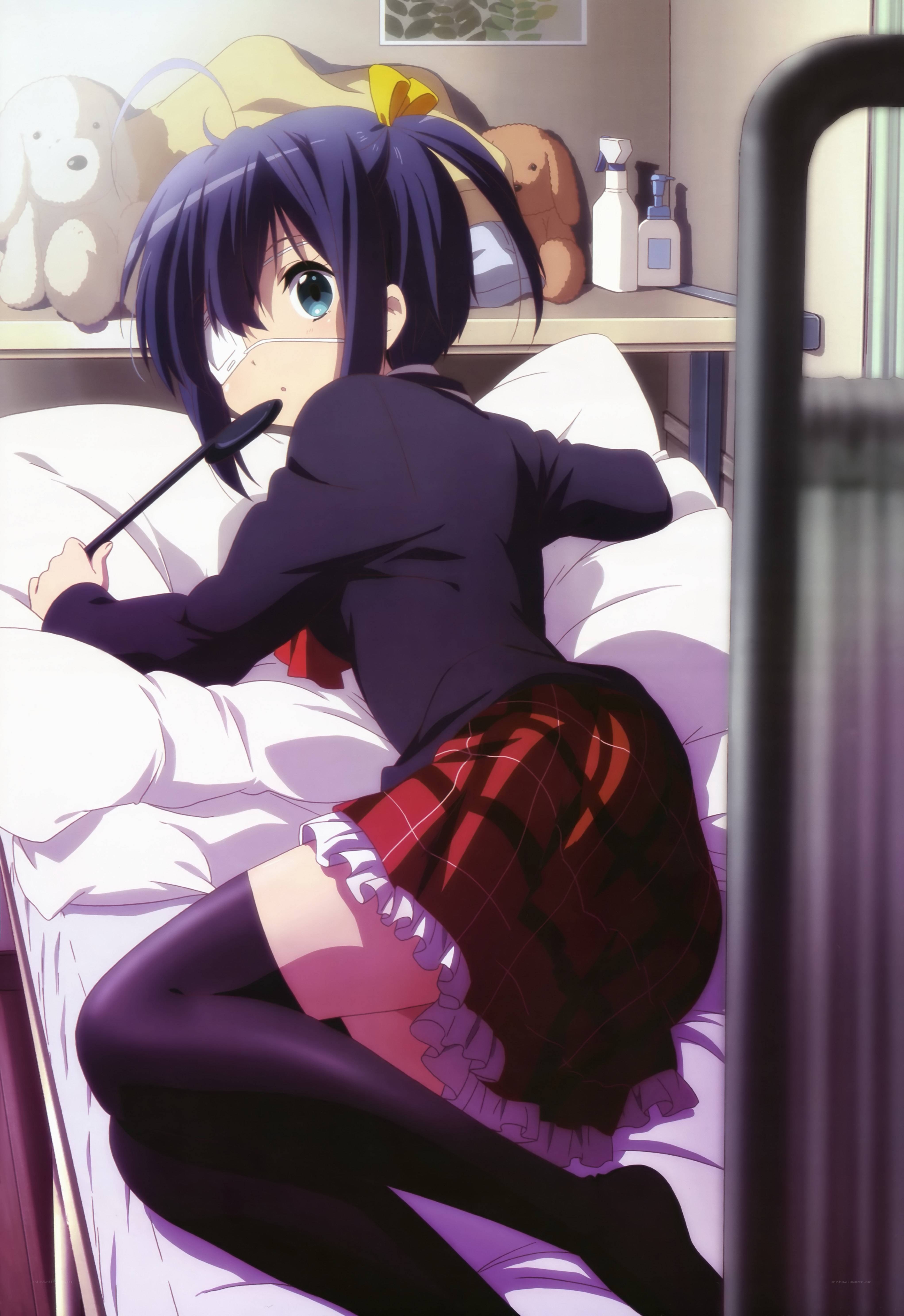 Anime girl in bed with spoon