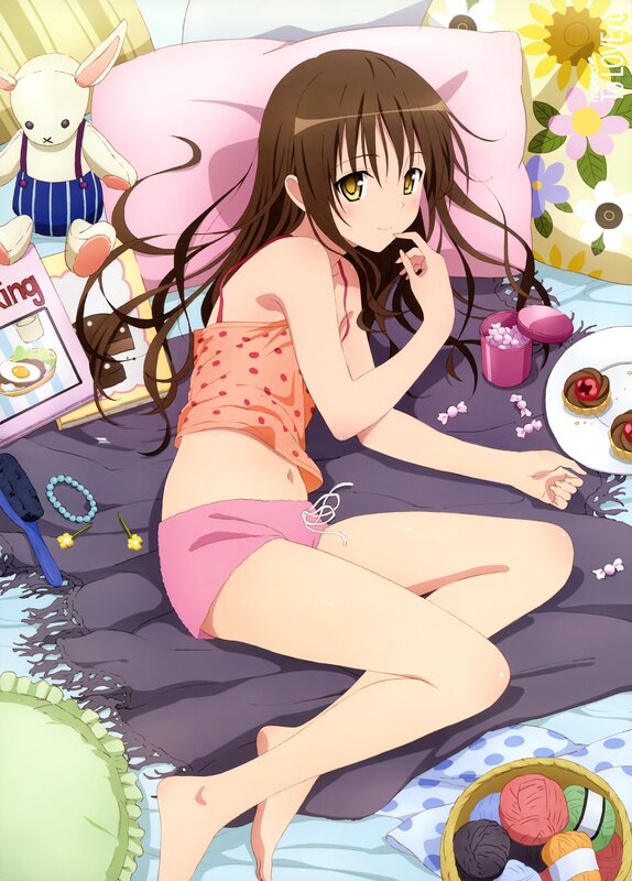 Anime girl in pajamas on bed