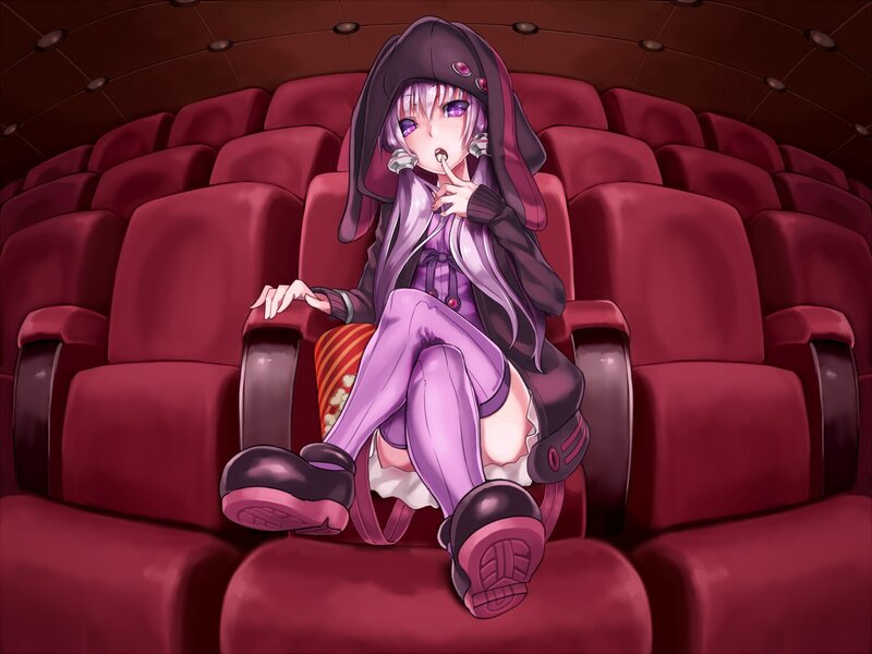 Anime girl in theater seat