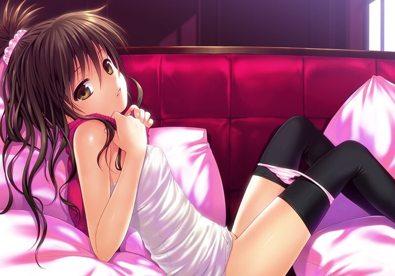 Anime girl on a pink bed