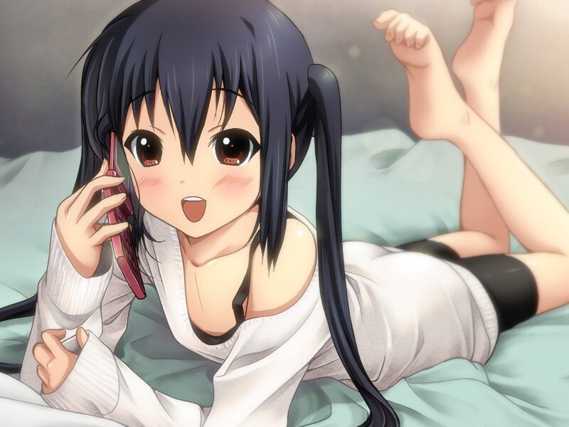 anime girl on phone in bed