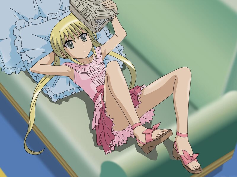 Anime girl reading on a couch