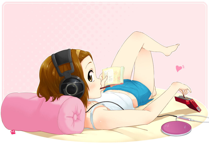 anime girl reading with headphones