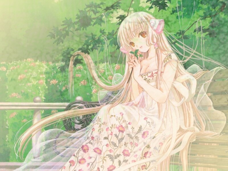 Anime girl with flower in garden