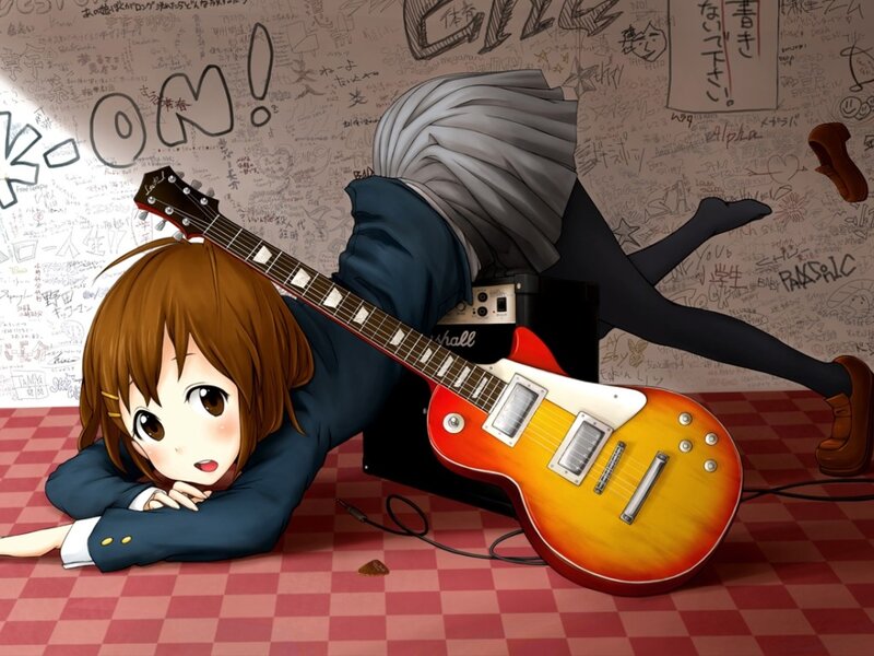 Anime girl with guitar on floor
