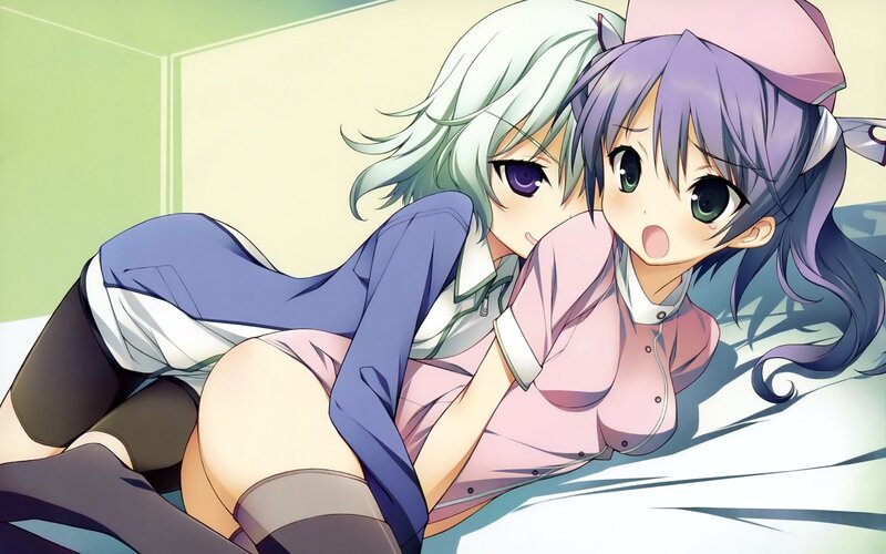 Anime girls on a bed