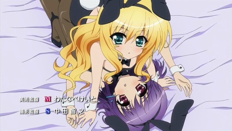 Anime girls on a bed