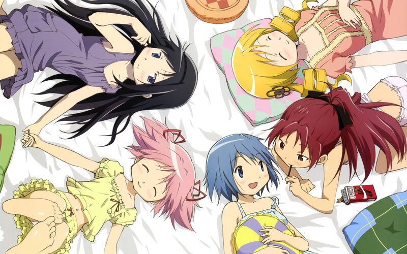 anime girls relaxing on bed