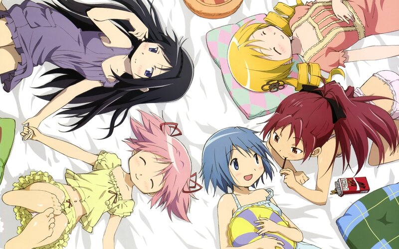 anime girls relaxing on bed