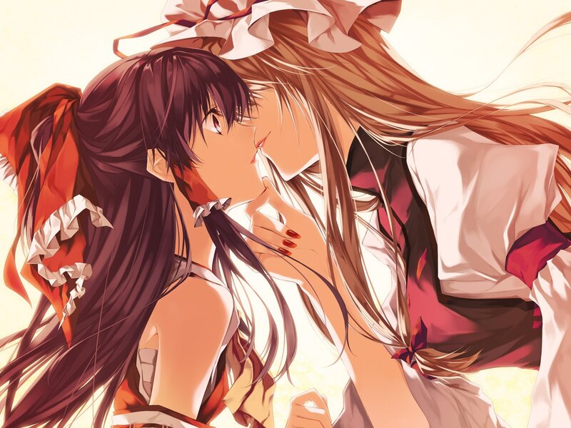 anime girls sharing a kiss