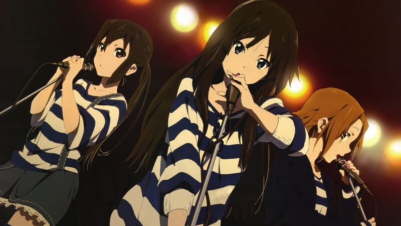 anime girls singing on stage