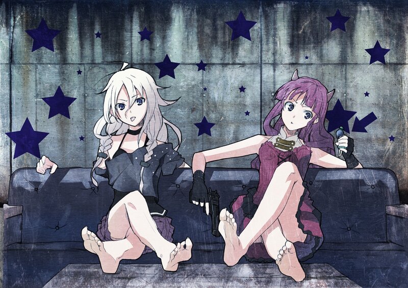 Anime girls with guns on a couch