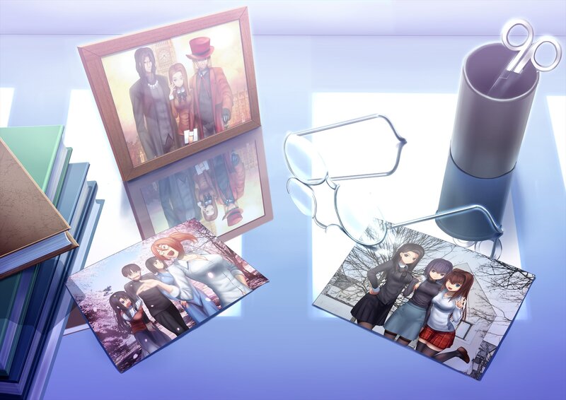 Anime photos on a desk