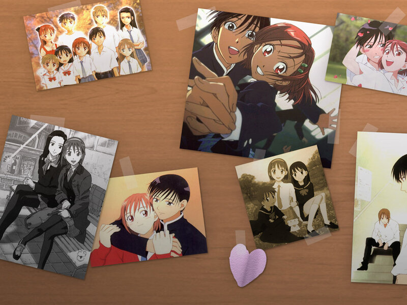 anime photos on a wooden table