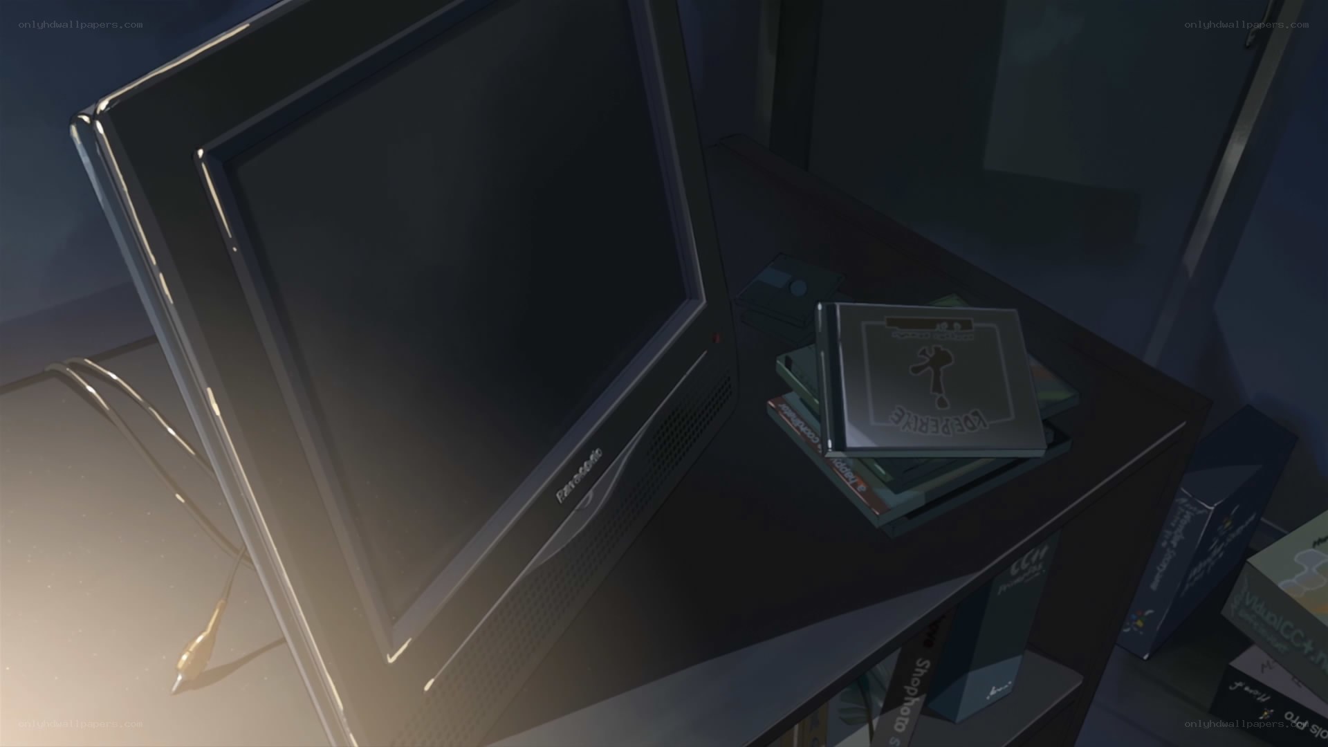 anime room with computer and media