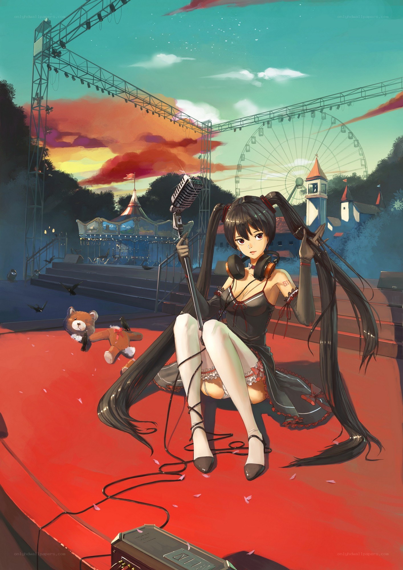 Anime singer on stage at sunset