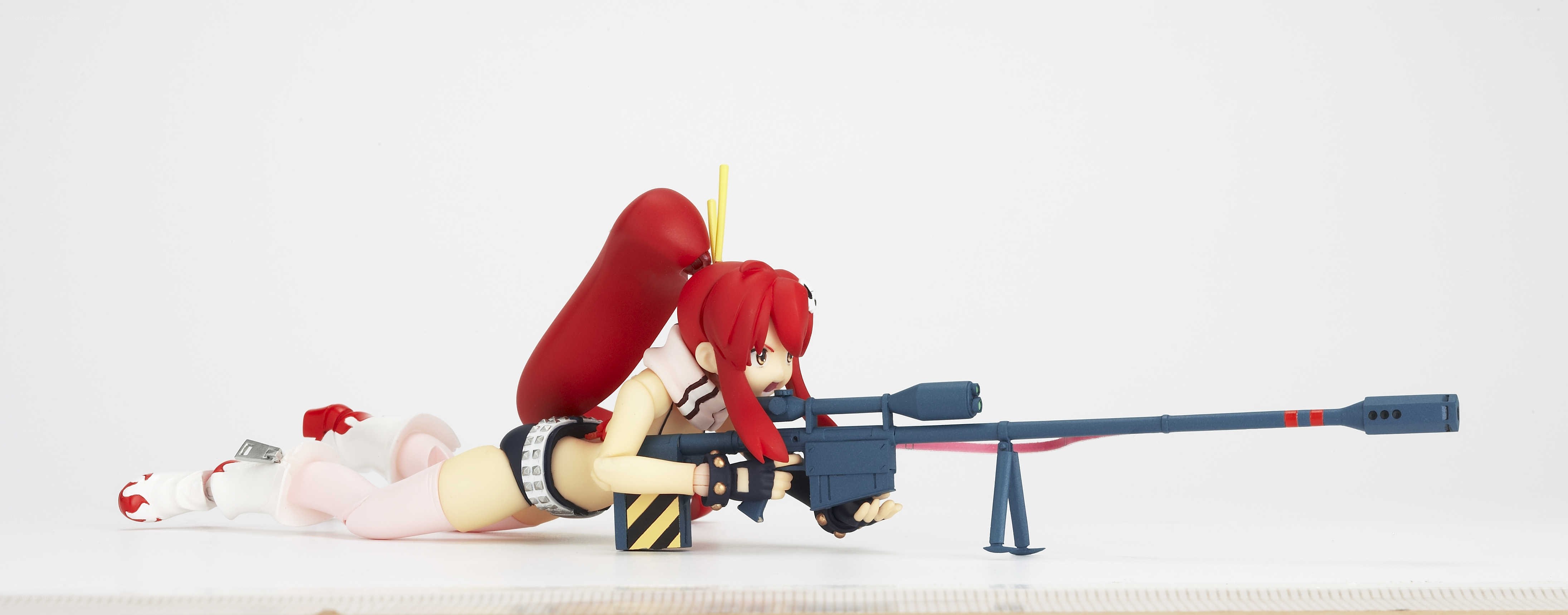 Anime sniper figure in action
