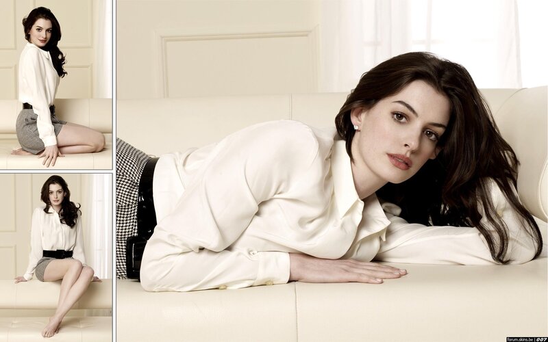 Anne Hathaway on a sofa