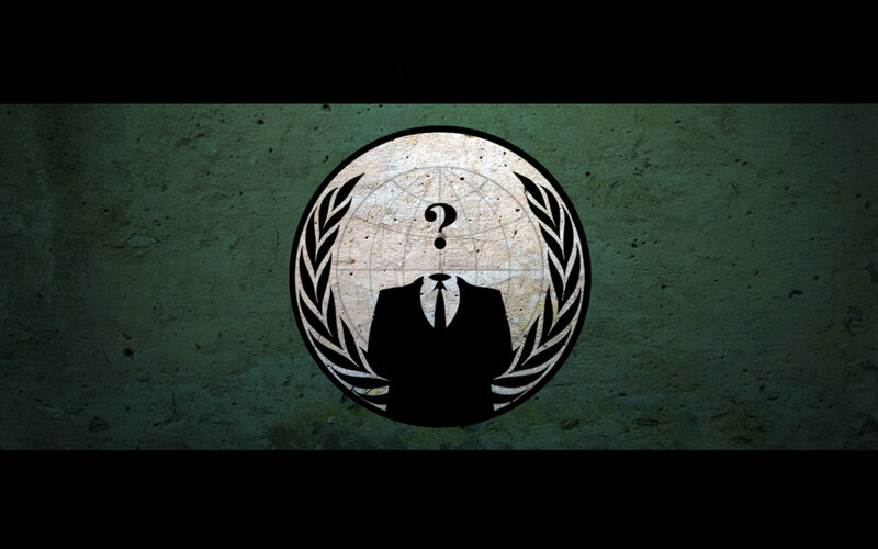 Anonymous symbol on concrete wall