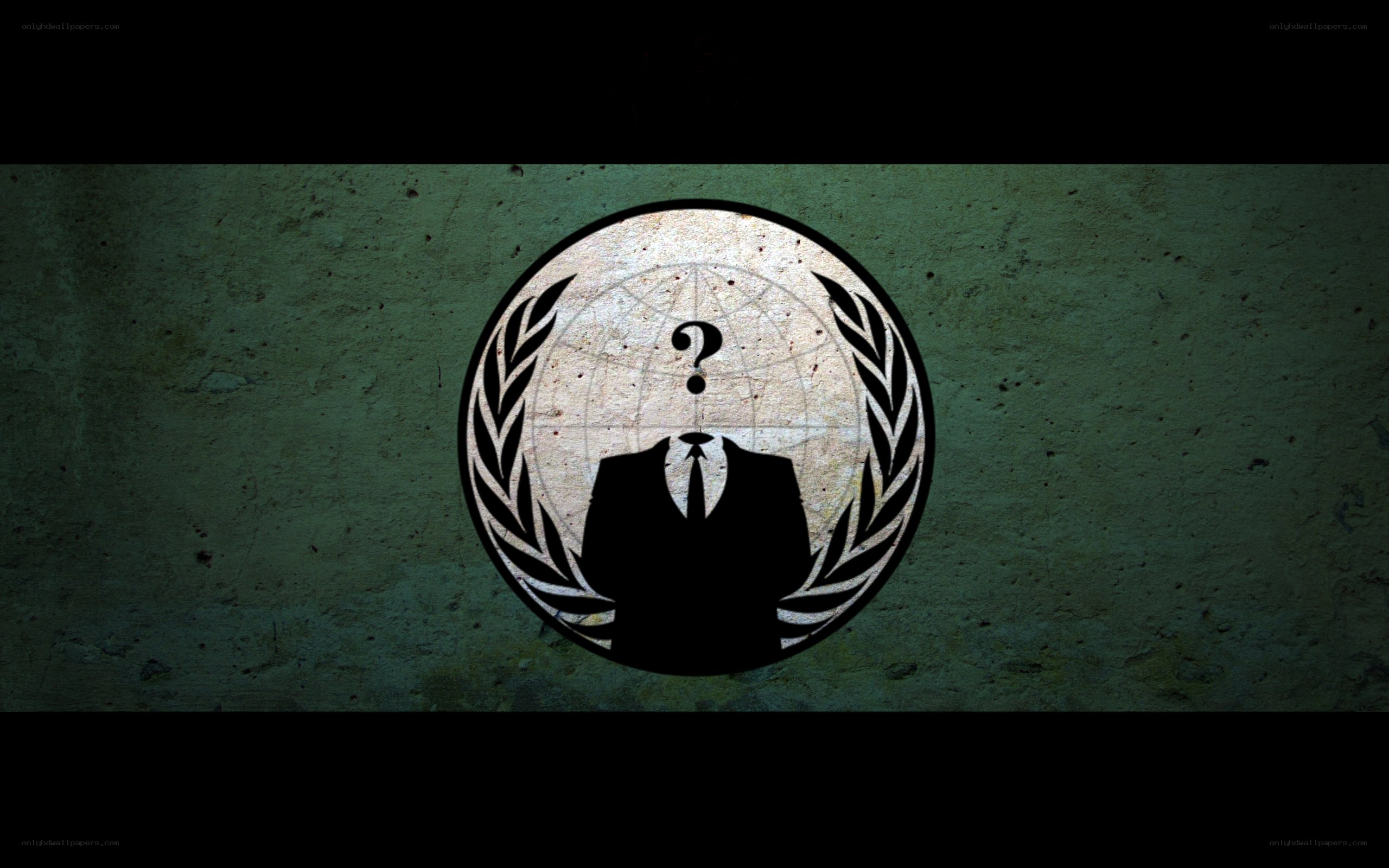 Anonymous symbol on concrete wall