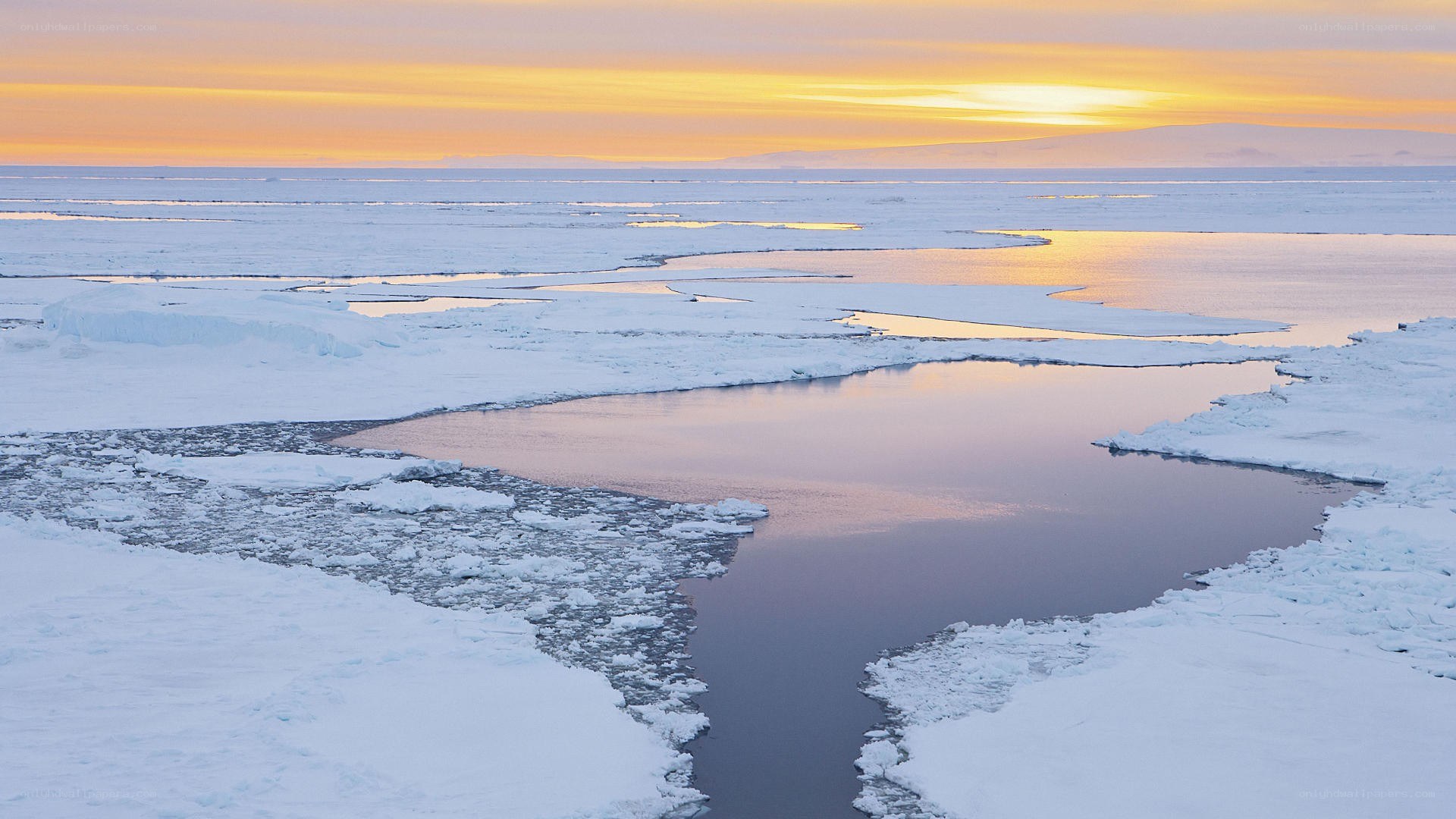 Antarctic ice at sunset