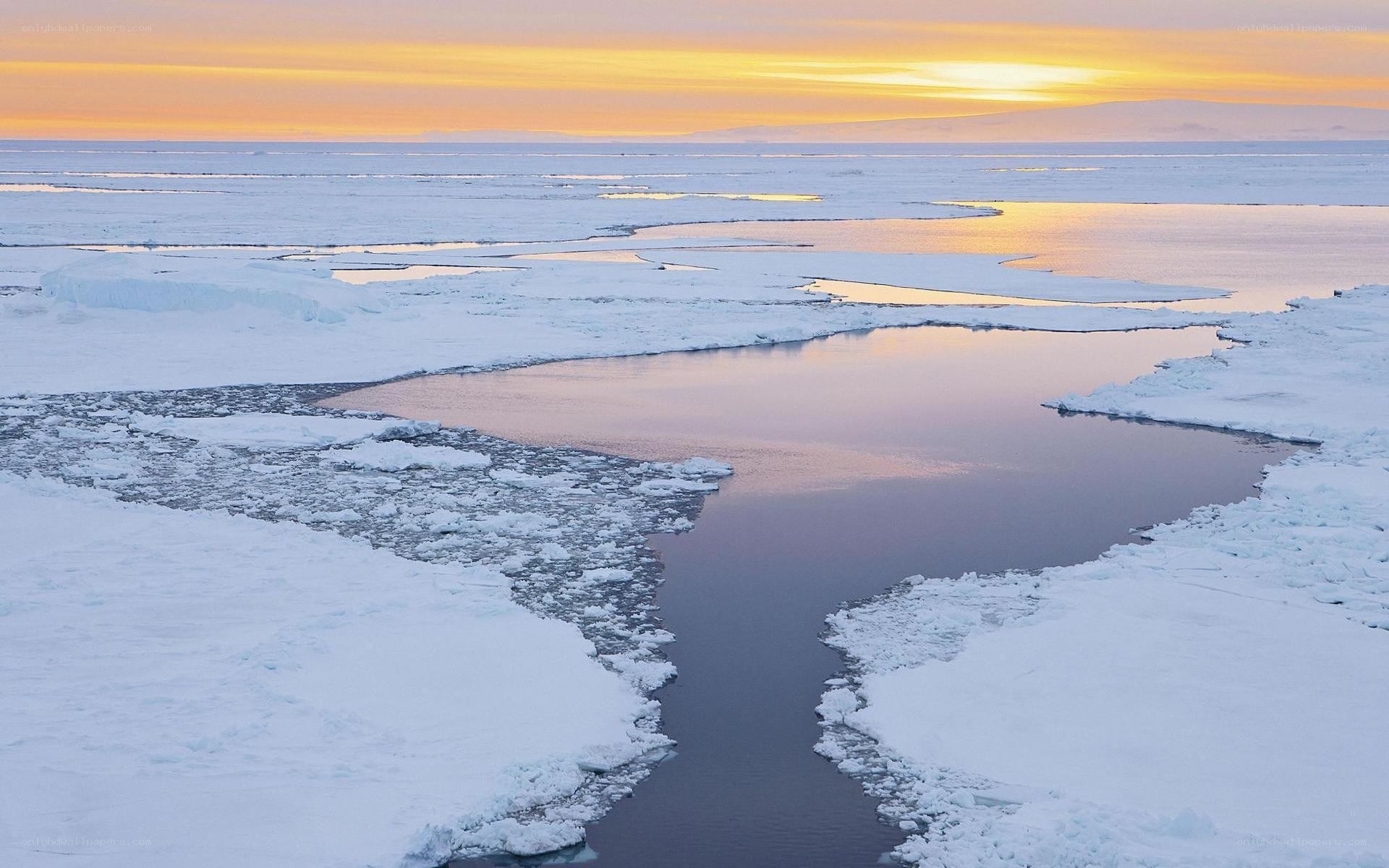 Antarctic ice melt at sunset