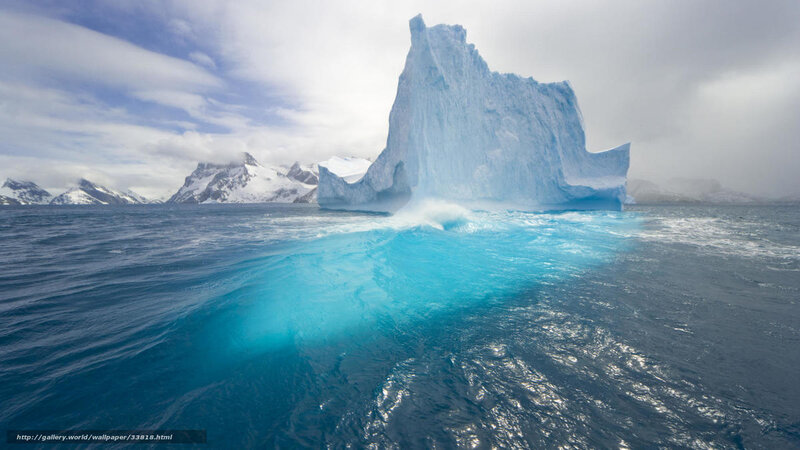 Antarctic iceberg in blue water