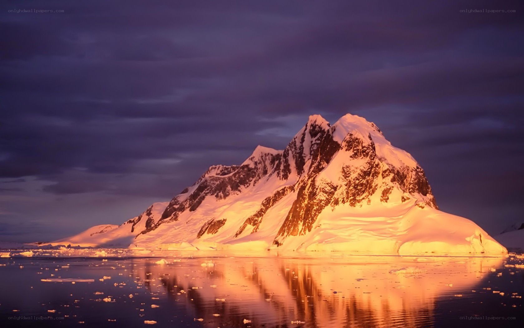 Antarctic mountain at sunset